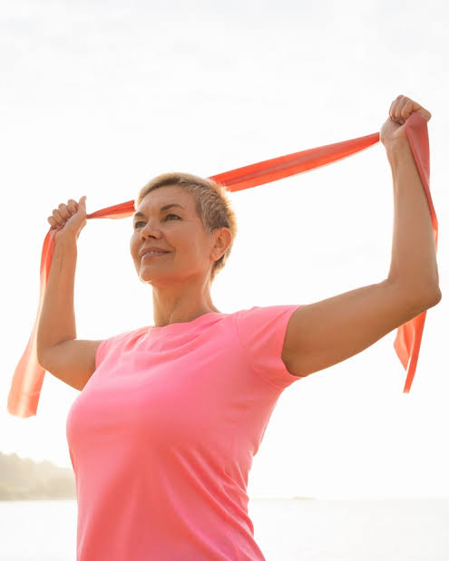 Cancer survivor enjoying a healthy lifestyle after cancer with gentle outdoor exercise